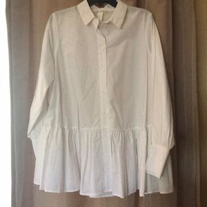 🛍 White button down blouse.